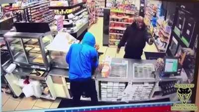 Robbers with fake gun meet security with real gun