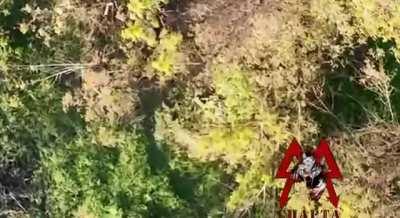 A Russian drone of battalion Sparta dropping munition on Ukrainian soldiers. Place Opytnoe, Donetsk area. Two days ago.