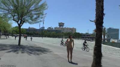 Showing off perfect body totally naked in public