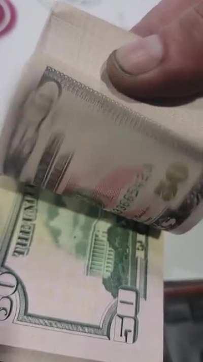 100 sequential 50's in a stack