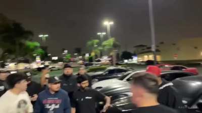 Hands thrown at a car meet