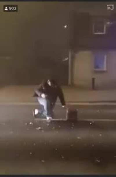 WCGW lighting fireworks in the middle of the street