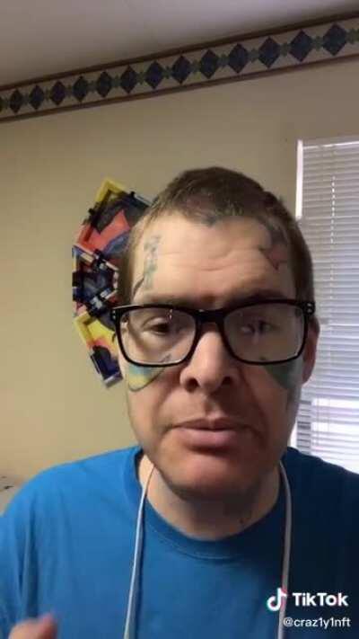 Cool Guy with Face Tats has a message