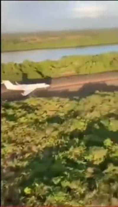 Drug traffickers' jet escaping a military helicopter in Jalisco, Mexico.