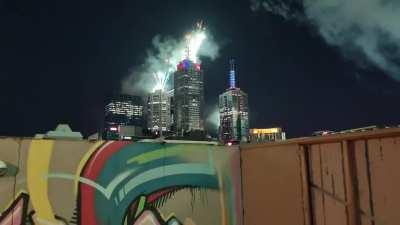 Viewing fireworks from rooftop balcony