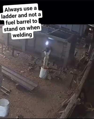 WCGW Standing on a fuel barrel while welding