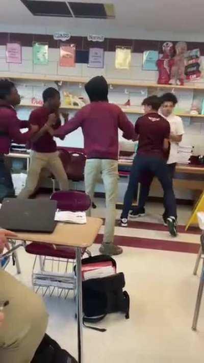 Teacher Gets Hit Trying to Stop a Fight in Class