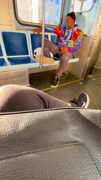 Man on train asking people for assistance taking off his ankle monitor that was going off. 