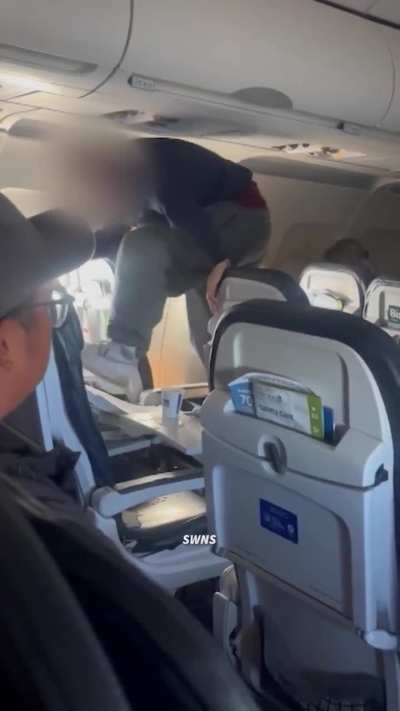 Man casually destroys a chair