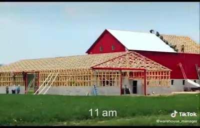 Building a barn in a day the old fashioned way:
