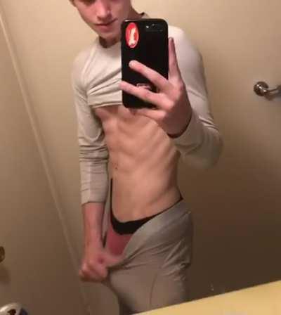 Put one hand on each side of my boxers and slowly pull out my massive cock!