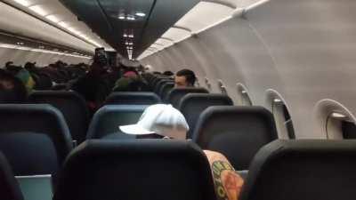 Max Berry gets duct taped to his seat after spazzing out and attacking flight attendants