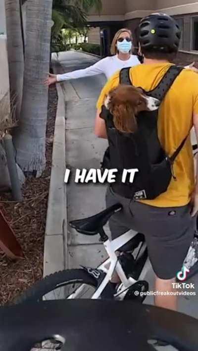 Make Karen on a bike raging at a pedestrian who wants to use the pedestrian sidewalk