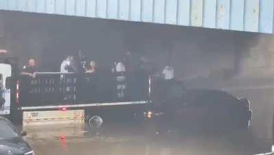 Multiple People Rescued From Rising Flood Waters On The Major Degan Express Way In The Bronx