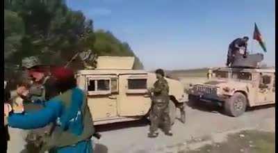 Afghan National Army mass surrendering to the Taliban on June 22, 2021. You can see ANA soldiers handing in all their firearms in a pile as well has handing in their Humvees in a straight line.