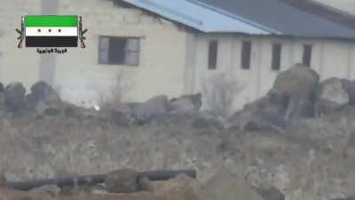 Syrian Army and FSA PKM gunners stand tall and hip fire rounds at each other from hundreds of meters away - Daraa - 2015