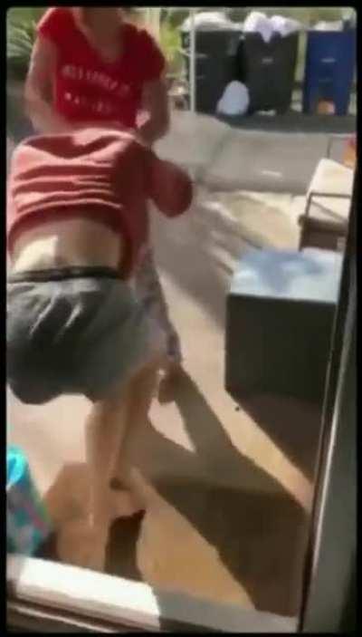 Enraged chick drags, stomps, and spits on girl who “exposed” her