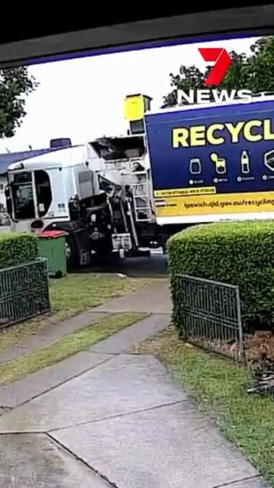 Garbage bin goes for a ride