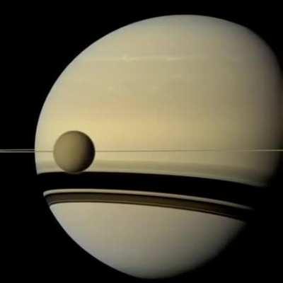 Timelapse of Io and Europa orbiting Jupiter. Shot by Cassini.