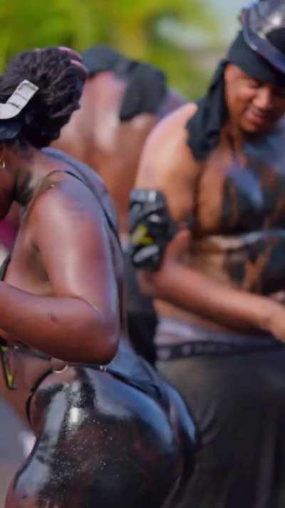 Getting oiled up for Grenada Jab Jab (@melaxgoddess)