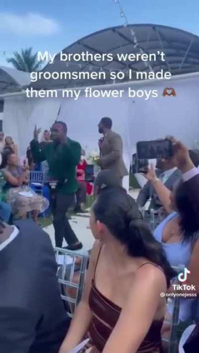 Brothers weren't groomsmen so she made them Flower Boys 🌸