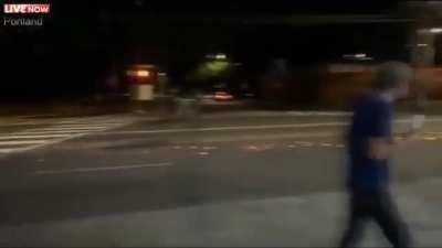 Portland Protesters shoot at vehicle