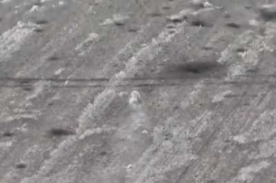 Russian soldier on fire (?) gets hit by a Ukrainian kamikaze drone at a graveyard near Pokrovsk. March 2025