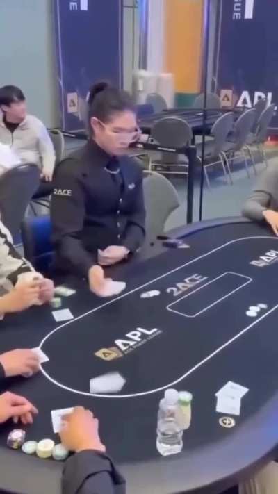 This poker dealer effortlessly deals cards with one hand