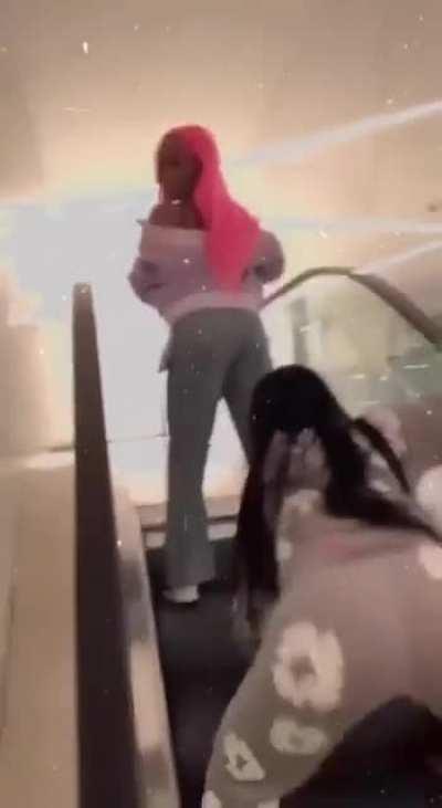 winter shaking ass on the escalator