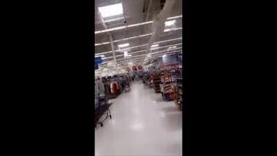 Riding a motorcycle in Walmart