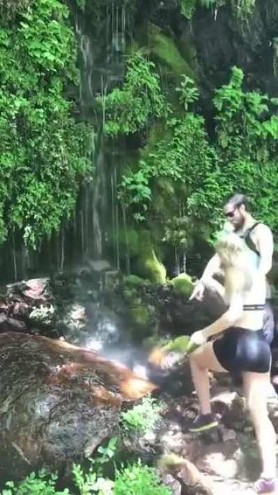 Trying to stand on a slippery rock