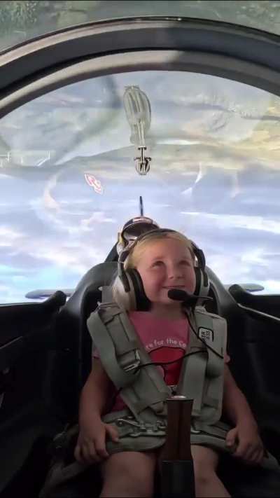 Champion aerobatic pilot takes his daughter for a spin