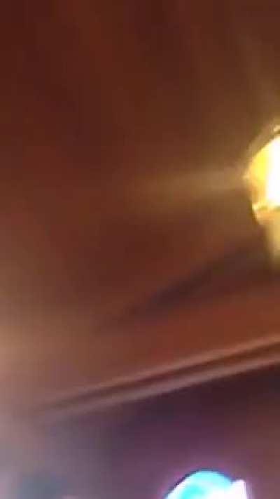 Wave breaks through restaurant