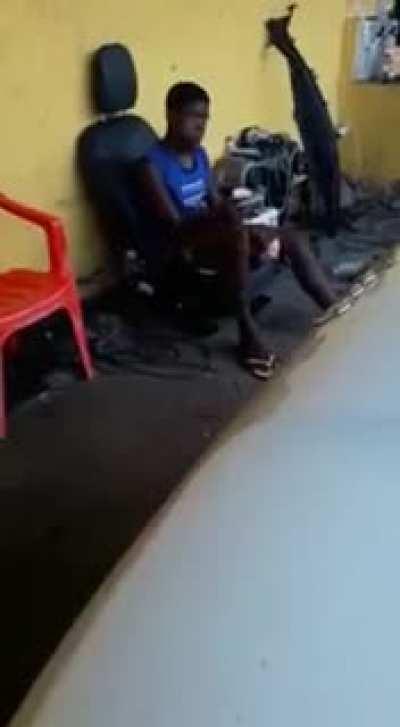 Man sits on car chair with exploding air bag