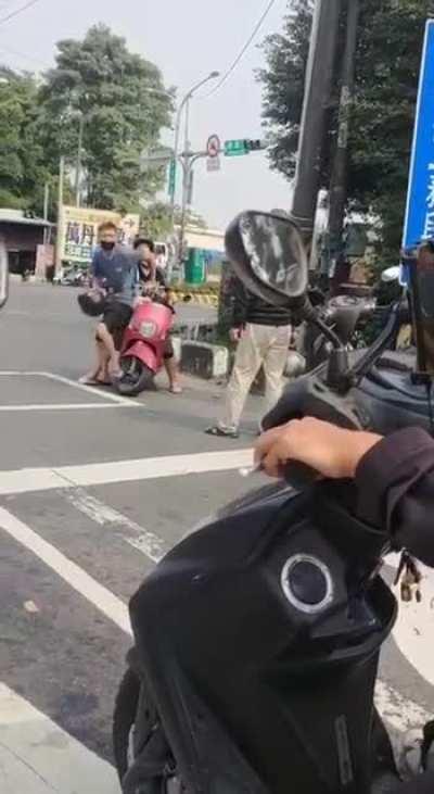 Helmets Bonking during Road Rage Show Down in Republic of China