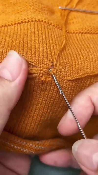 Mending a sweater