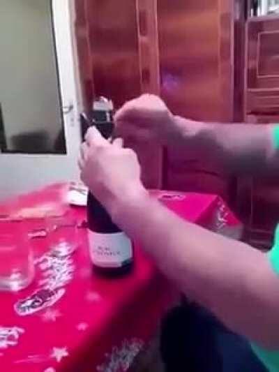 WCGW popping open a champagne under a light