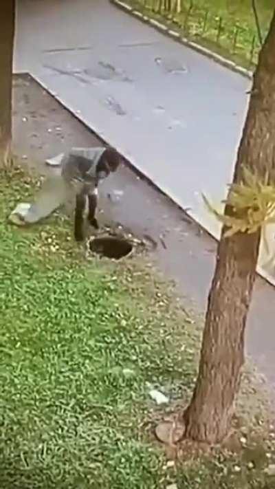 Walking over sewer shaft