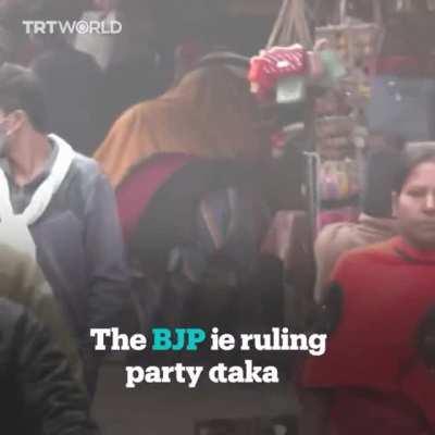 This photo of Muslim students forced to sit outside their classroom in India went viral.