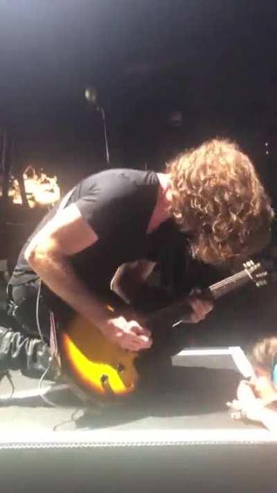 Ray jamming out for his kids at last night show .