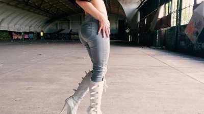 White PVC Buckle Boots and Tight Jeans