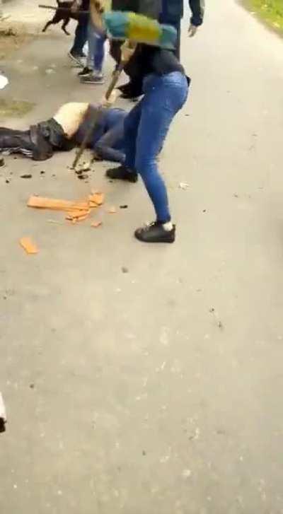 Angry mob catches a rapist