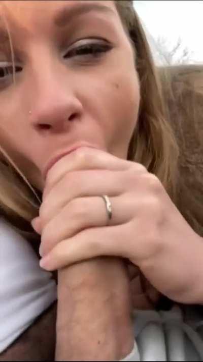 Both men smiling, one truly happy.