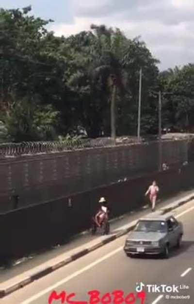 Crazy guy, who has been escaping of mental institution follows people with knife