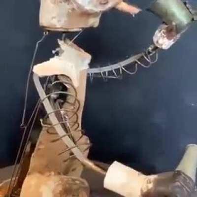 Antique bear automaton whose fur was destroyed by an infestation of moths.