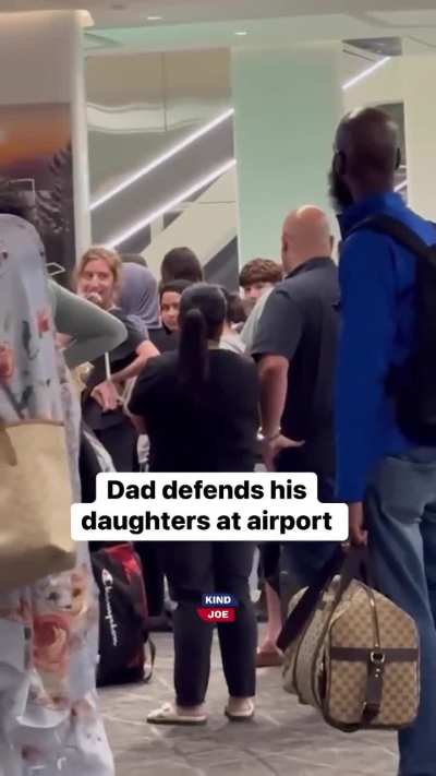 Guy defends daughter at airport