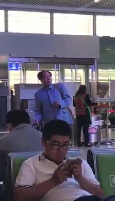 Comrade Mao arriving at LAX circa 7/31 after learning about comrade Azooni's new apartment's cut electricity