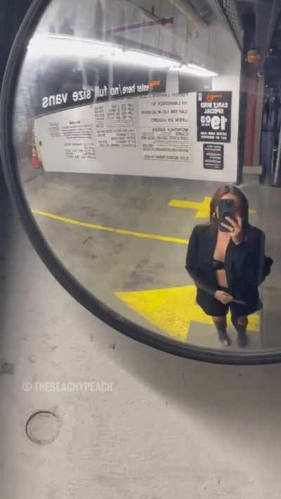 Taking a selfie in a bubble mirror after a few drinks