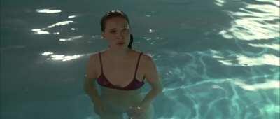 Natalie swimming in the pool