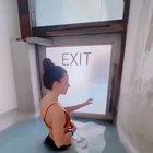 Click Here If You Want To See A Girl In Some Water Opening A Door To Look At Some Mountains In Iceland.